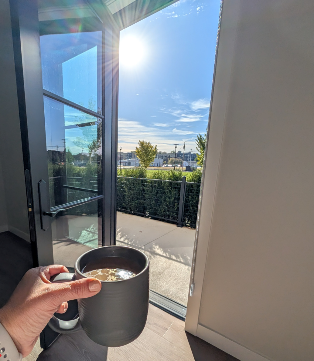 image (10) Person enjoying coffee at their apartment in Elhart, IN.